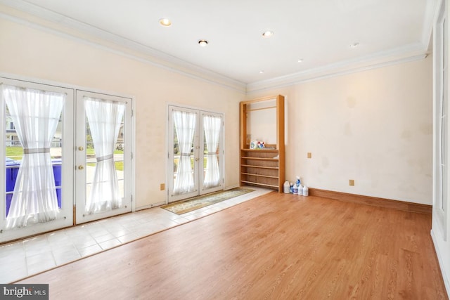 2363 Ashford Dr, Waldorf, MD 20603 - unfurnished room with french doors, crown molding, and wood finished floors