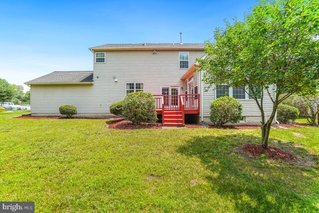 2363 Ashford Dr, Waldorf, MD 20603 - rear view of property with a wooden deck and a lawn