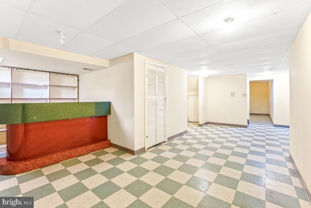 2363 Ashford Dr, Waldorf, MD 20603 - finished basement featuring a paneled ceiling and tile patterned floors