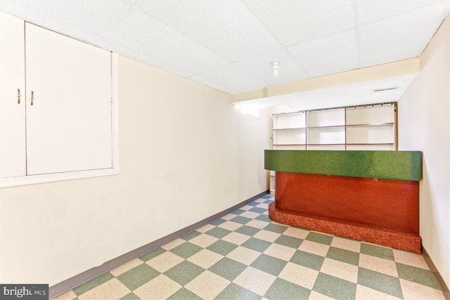 2363 Ashford Dr, Waldorf, MD 20603 - unfurnished bedroom with tile patterned floors and a paneled ceiling