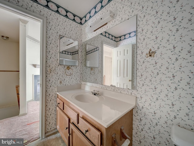 15069 Maple Glen Ct, Dumfries, VA 22025 - bathroom featuring vanity and wallpapered walls