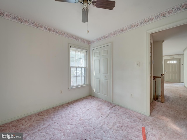 15069 Maple Glen Ct, Dumfries, VA 22025 - unfurnished bedroom featuring carpet flooring, a closet, and a ceiling fan