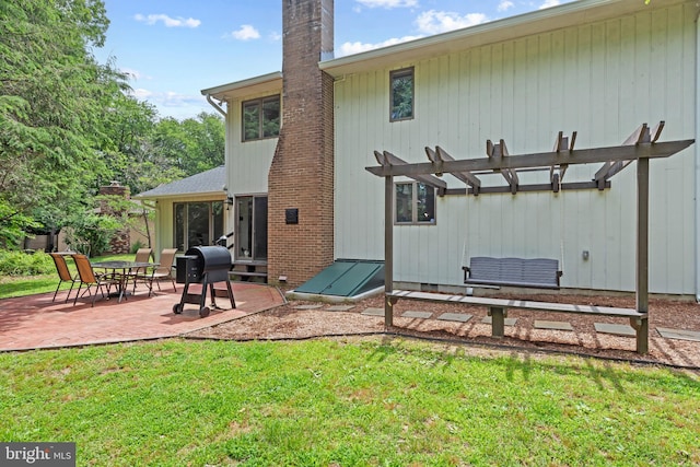 602 Sweet Brush Ct, Severna Park, MD 21146 - back of property featuring a pergola, a patio area, a lawn, a sunroom, and a chimney