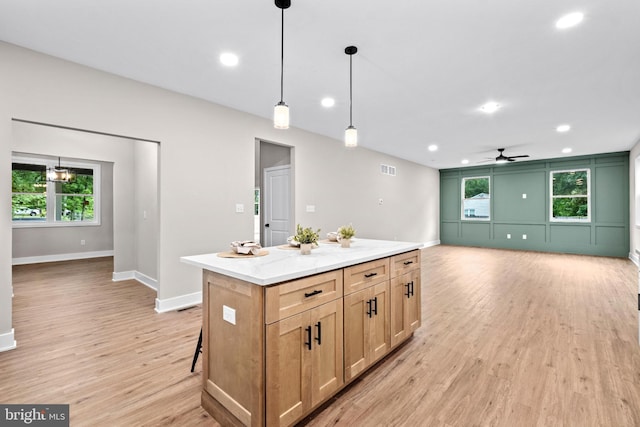 2725 S Sunset Ave, Williamstown, NJ 08094 - kitchen featuring light wood-type flooring, recessed lighting, a ceiling fan, a kitchen island, and pendant lighting