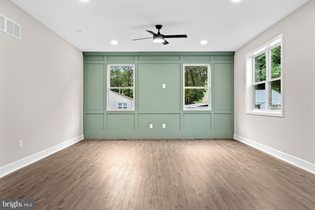 2725 S Sunset Ave, Williamstown, NJ 08094 - spare room featuring a decorative wall, wood finished floors, a ceiling fan, and recessed lighting