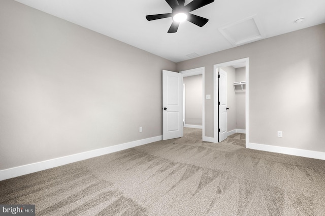 2725 S Sunset Ave, Williamstown, NJ 08094 - unfurnished bedroom featuring attic access, light carpet, a spacious closet, a closet, and a ceiling fan