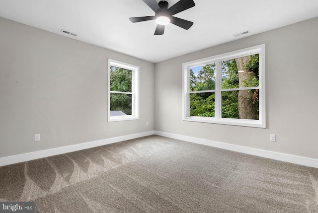 2725 S Sunset Ave, Williamstown, NJ 08094 - unfurnished room featuring healthy amount of natural light, carpet floors, and a ceiling fan