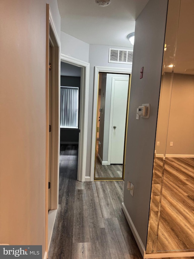 225 Barclay Ct, West Deptford, NJ 08051 - hallway featuring wood finished floors and baseboards