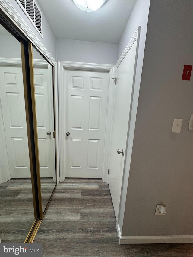225 Barclay Ct, West Deptford, NJ 08051 - hallway with dark wood-type flooring and baseboards