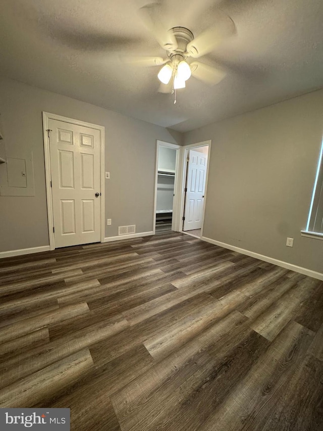 225 Barclay Ct, West Deptford, NJ 08051 - unfurnished bedroom with baseboards, dark wood-style floors, and a ceiling fan