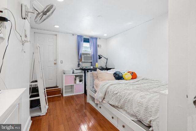 1228 S 22nd St, Philadelphia, PA 19146 - bedroom featuring wood finished floors, recessed lighting, and cooling unit