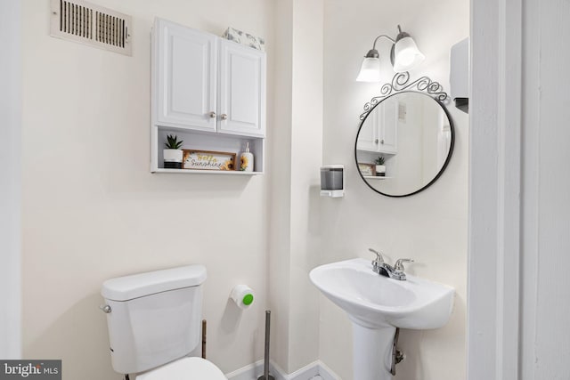 1228 S 22nd St, Philadelphia, PA 19146 - bathroom featuring toilet and a sink