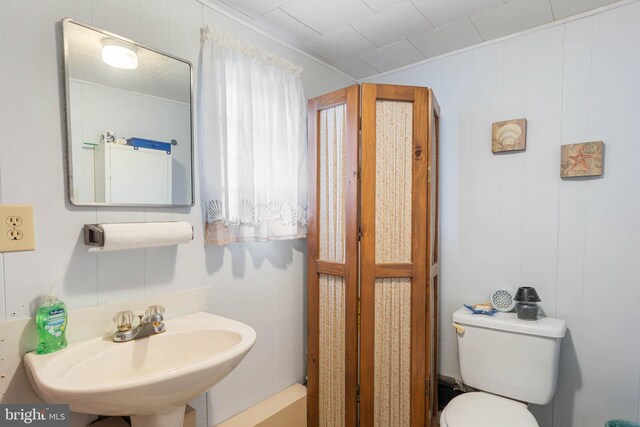 8 Clam Rd Unit 13891, Millsboro, DE 19966 - half bathroom featuring a sink and toilet