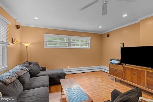 440 E Magnolia Dr, Morrisville, PA 19067 - living area with baseboard heating, wood finished floors, a ceiling fan, ornamental molding, and recessed lighting