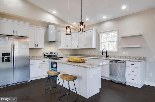 880 Campers Ln, Ruther Glen, VA 22546 - kitchen with appliances with stainless steel finishes, wall chimney exhaust hood, dark wood-type flooring, open shelves, and white cabinets
