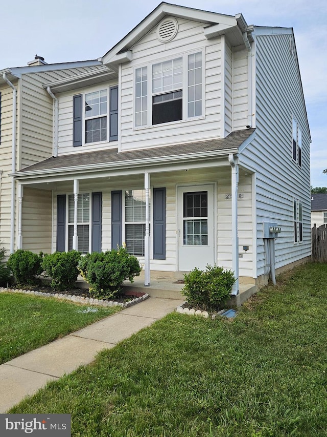 2530 Fernwood Ct, Waldorf, MD 20601 - view of front of property featuring a porch and a front yard
