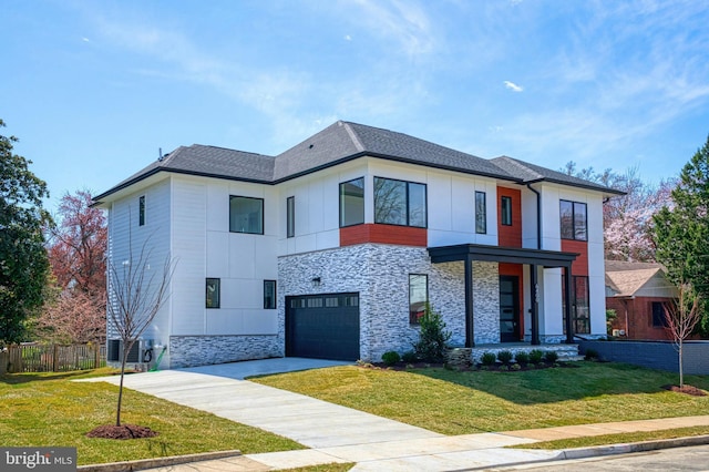 6400 26th St N, Arlington, VA 22207 - modern home with stone siding, driveway, an attached garage, and roof with shingles