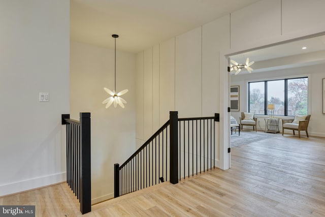 6400 26th St N, Arlington, VA 22207 - staircase featuring wood finished floors and a chandelier