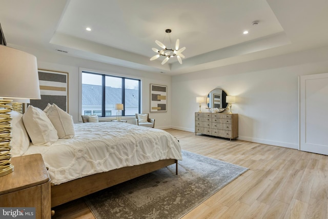 6400 26th St N, Arlington, VA 22207 - bedroom with a tray ceiling, a chandelier, light wood-style floors, and recessed lighting