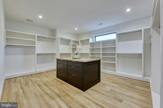 6400 26th St N, Arlington, VA 22207 - walk in closet with light wood finished floors