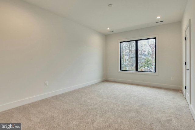 6400 26th St N, Arlington, VA 22207 - spare room featuring light carpet and recessed lighting