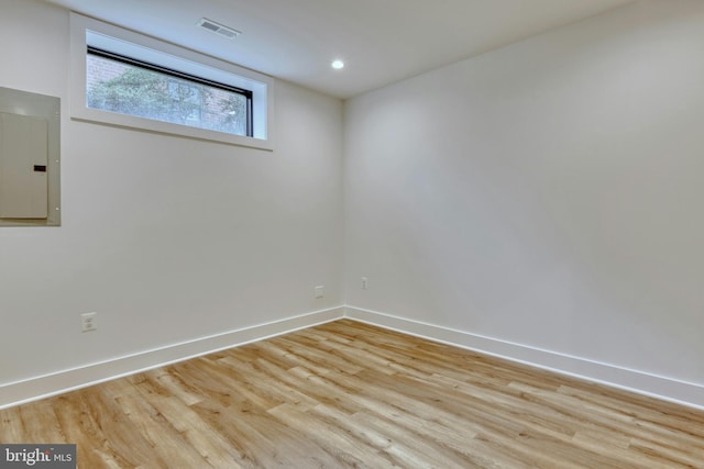 6400 26th St N, Arlington, VA 22207 - empty room with electric panel, light wood finished floors, and recessed lighting
