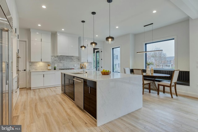 6400 26th St N, Arlington, VA 22207 - kitchen featuring modern cabinets, light wood finished floors, healthy amount of natural light, and recessed lighting