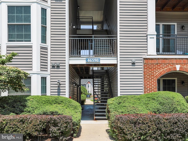 46598 Drysdale Ter Unit 302, Sterling, VA 20165 - view of property featuring stairway