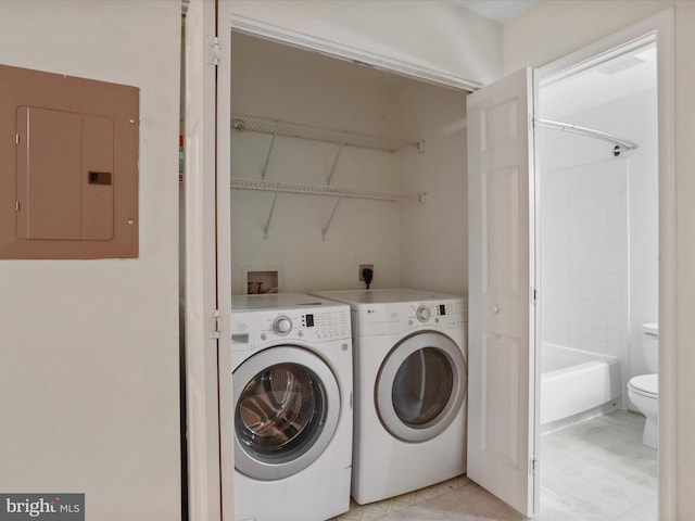 46598 Drysdale Ter Unit 302, Sterling, VA 20165 - laundry room with electric panel and washer and clothes dryer