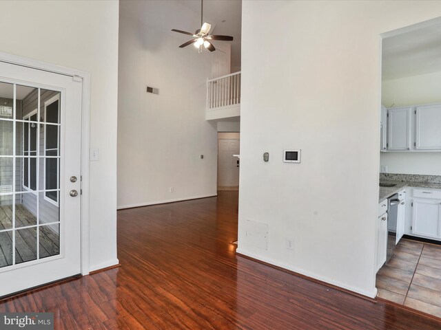 46598 Drysdale Ter Unit 302, Sterling, VA 20165 - interior space with wood finished floors, ceiling fan, and a high ceiling