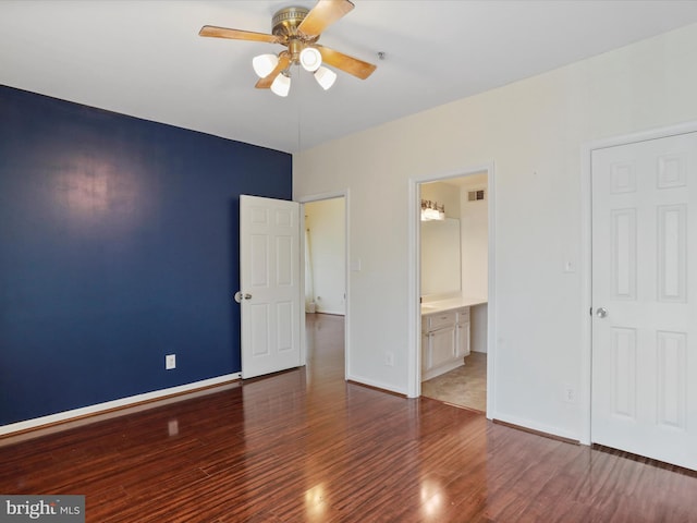46598 Drysdale Ter Unit 302, Sterling, VA 20165 - unfurnished bedroom with wood finished floors, ensuite bathroom, and a ceiling fan