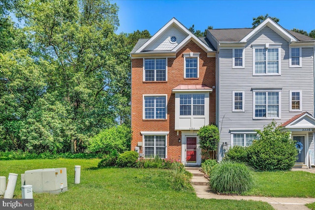 2222 Commissary Cir Unit 198, Odenton, MD 21113 - view of front of home featuring a front lawn