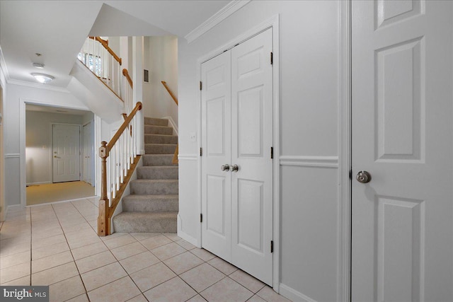 2222 Commissary Cir Unit 198, Odenton, MD 21113 - staircase featuring crown molding and tile patterned floors
