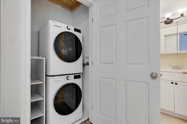 2222 Commissary Cir Unit 198, Odenton, MD 21113 - laundry room featuring stacked washing machine and dryer