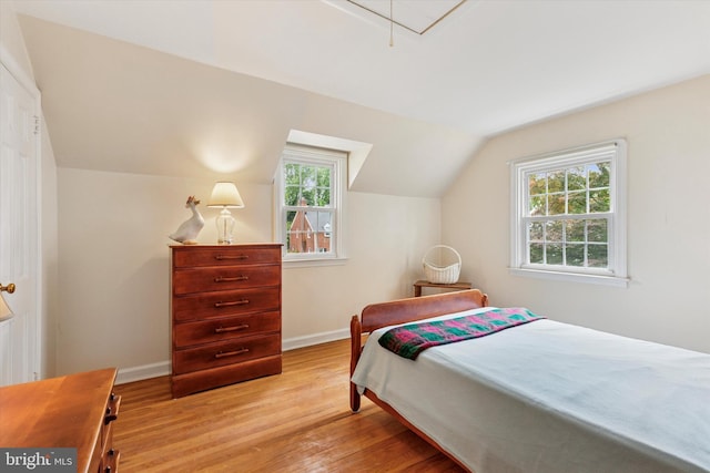 515 Marks Rd, Oreland, PA 19075 - bedroom with multiple windows, light wood finished floors, lofted ceiling, and attic access