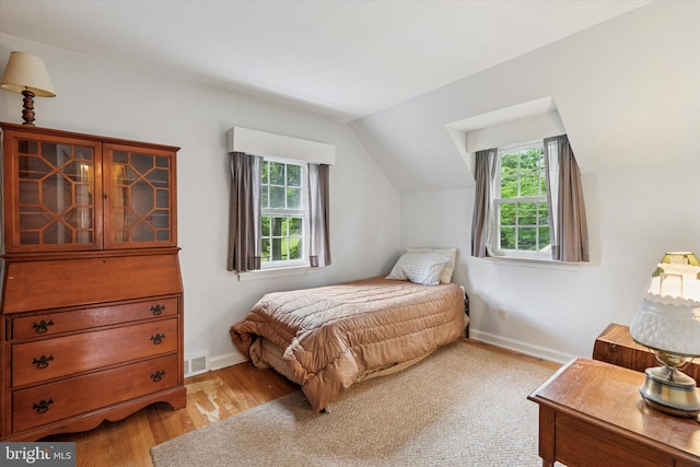 515 Marks Rd, Oreland, PA 19075 - bedroom with vaulted ceiling and light wood-style flooring