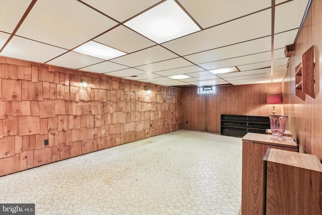 515 Marks Rd, Oreland, PA 19075 - below grade area with a drop ceiling, tile patterned floors, and wooden walls
