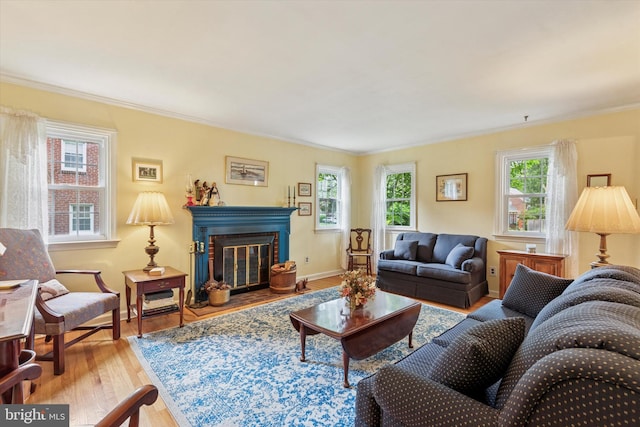 515 Marks Rd, Oreland, PA 19075 - living room featuring crown molding, wood finished floors, and a fireplace