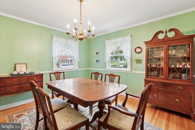 515 Marks Rd, Oreland, PA 19075 - dining room featuring a chandelier, healthy amount of natural light, light wood-style floors, and ornamental molding
