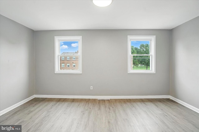 8206 Boundary, Baltimore, MD 21222 - spare room with wood finished floors