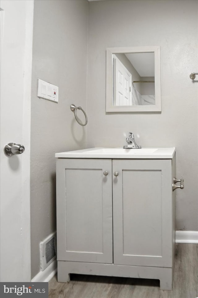 8206 Boundary, Baltimore, MD 21222 - bathroom featuring wood finished floors and vanity