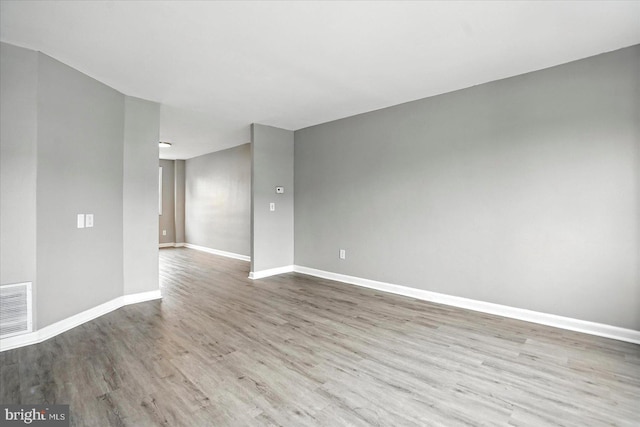 8206 Boundary, Baltimore, MD 21222 - unfurnished room featuring baseboards and wood finished floors
