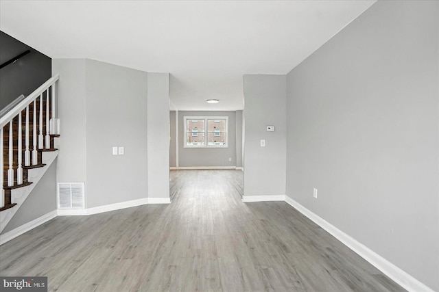 8206 Boundary, Baltimore, MD 21222 - spare room featuring stairway and wood finished floors