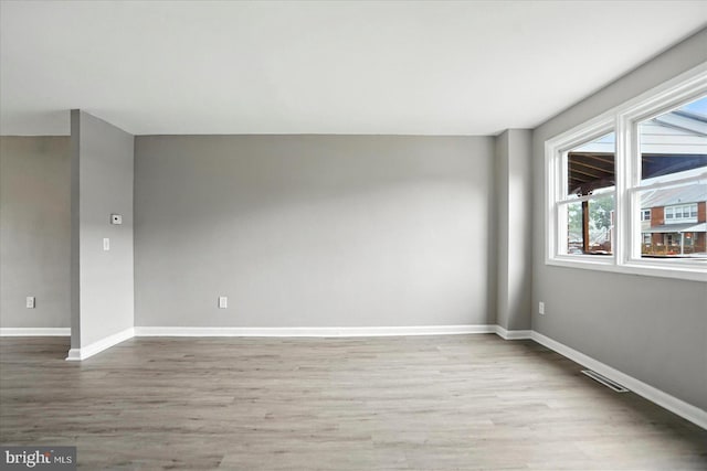 8206 Boundary, Baltimore, MD 21222 - unfurnished room with wood finished floors and baseboards