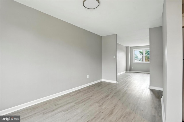 8206 Boundary, Baltimore, MD 21222 - spare room with wood finished floors and baseboards
