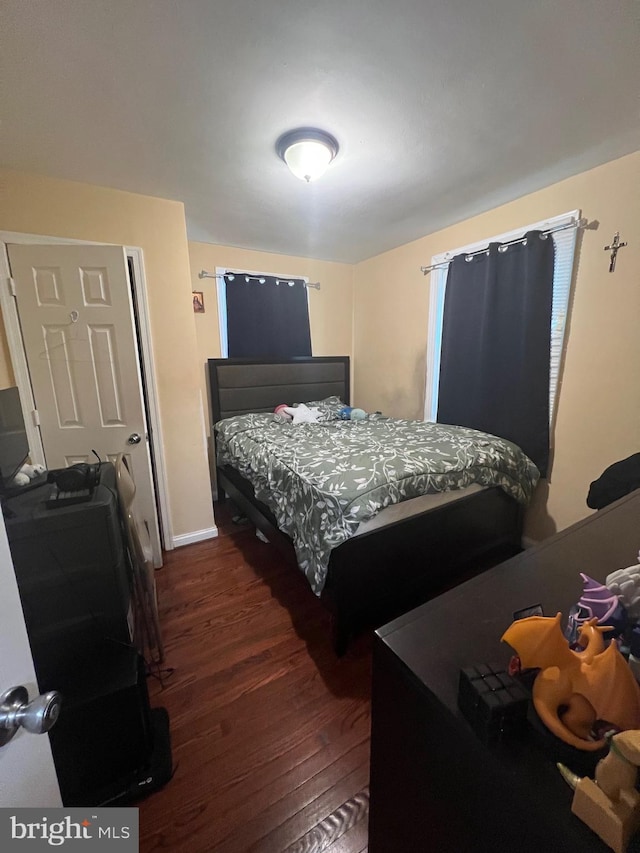 5702 Landover Rd, Hyattsville, MD 20784 - bedroom with dark wood-type flooring