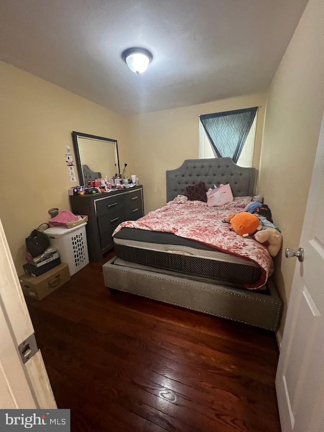 5702 Landover Rd, Hyattsville, MD 20784 - bedroom with dark wood-style flooring