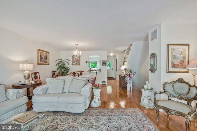 1312 Cedar Park Rd, Annapolis, MD 21401 - living room with wood finished floors and a chandelier