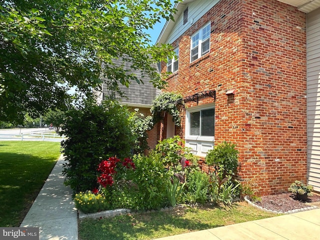 1312 Cedar Park Rd, Annapolis, MD 21401 - view of property exterior featuring brick siding and a yard