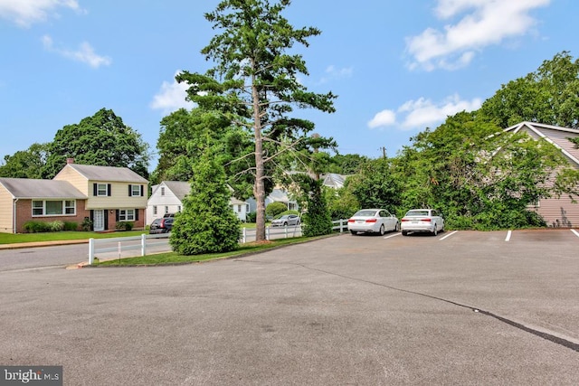1312 Cedar Park Rd, Annapolis, MD 21401 - uncovered parking lot featuring a residential view